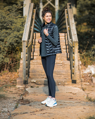 Banded Casual Women's Renew Down Vest model Tori Lee enjoying a morning run outdoors
